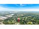 A tranquil neighborhood with lush greenery and well-maintained homes seen from above in an aerial shot at 3035 Landington Way, Duluth, GA 30096