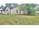 The backyard featuring a large grassy area at 3035 Landington Way, Duluth, GA 30096
