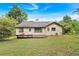 Spacious backyard features a wooden deck and offers plenty of room for outdoor activities at 3035 Landington Way, Duluth, GA 30096