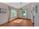 Dining room featuring a chandelier, natural light and wood floors at 3035 Landington Way, Duluth, GA 30096