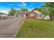 Charming one-story home featuring a two-car garage, brick accents, and a well-kept front yard at 3035 Landington Way, Duluth, GA 30096
