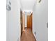 Hallway with fresh paint and updated laminate flooring at 3035 Landington Way, Duluth, GA 30096