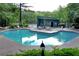 Relaxing pool and sundeck with chairs and tables is located near the clubhouse and tennis court at 1205 Mcclelen Way, Decatur, GA 30033