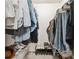 The closet has shelving and clothes hanging on rods, and shoes neatly placed on the shelves at 1205 Mcclelen Way, Decatur, GA 30033