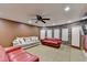 Basement featuring tile flooring, accent walls, a stone wall, and recessed lighting at 149 Stargrass Way, Grayson, GA 30017