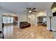 Open living room featuring hardwood floors, recessed lighting, and a seamless layout at 149 Stargrass Way, Grayson, GA 30017
