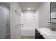 Clean bathroom with tub and shower, granite countertop, and white cabinets at 2272 Gateway Trl, Ellenwood, GA 30294