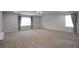 Expansive bonus room featuring neutral tones, recessed lighting, and abundant natural light, perfect for entertainment at 2272 Gateway Trl, Ellenwood, GA 30294