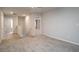 Neutral landing with carpet, white walls, and several entryways at 2272 Gateway Trl, Ellenwood, GA 30294