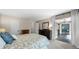 Bright bedroom features a neutral color palette, lots of natural light, and an attached office at 25305 Plantation Ne Dr, Atlanta, GA 30324