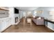 Bright living room showcases hardwood floors and open concept design with ample seating at 25305 Plantation Ne Dr, Atlanta, GA 30324