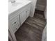 Bathroom featuring updated vanity with laminate wood flooring at 2565 Terrace Trl, Decatur, GA 30035