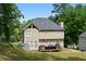 View of the backyard showcasing the home's deck and spacious outdoor area at 3075 Milford Sw, Marietta, GA 30008