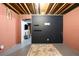 Partially finished basement offering potential as additional living space, with painted walls and concrete floors at 3075 Milford Sw, Marietta, GA 30008