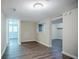 Finished basement with durable wood flooring, neutral paint, and lots of light at 3920 Stonewall Tell Rd, Atlanta, GA 30349