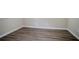 Finished basement area with light-colored walls and wood-look flooring at 3920 Stonewall Tell Rd, Atlanta, GA 30349