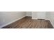 Finished basement area with wood flooring, and a neutral, bright interior at 3920 Stonewall Tell Rd, Atlanta, GA 30349