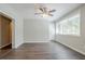 Bright, neutral bedroom with updated hardwood flooring at 3920 Stonewall Tell Rd, Atlanta, GA 30349