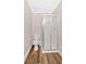 Compact bathroom with clean lines, new flooring, and a modern shower stall at 450 S Susan Creek Dr, Stone Mountain, GA 30083