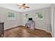 Neutral bedroom with sleek wood-look floors, and abundant natural light at 450 S Susan Creek Dr, Stone Mountain, GA 30083
