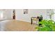 Bright living room with patterned tile flooring, white walls, and natural light at 450 S Susan Creek Dr, Stone Mountain, GA 30083