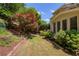 Landscaped backyard with retaining wall at 935 Brookline Way, Alpharetta, GA 30022