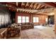 Partially finished basement with exposed ductwork and windows for ample light at 935 Brookline Way, Alpharetta, GA 30022