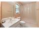 Bathroom featuring single sink with white cabinets, a large mirror, and shower at 935 Brookline Way, Alpharetta, GA 30022