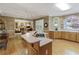 This beautiful kitchen has an island and connects to the living room for an open concept at 935 Brookline Way, Alpharetta, GA 30022