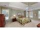 Serene main bedroom boasts a trey ceiling, ample natural light, and generous space at 935 Brookline Way, Alpharetta, GA 30022