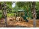 Community playground with slides, climbing wall and stairs for hours of fun at 935 Brookline Way, Alpharetta, GA 30022