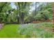 Inviting backyard featuring lush greenery, a charming fence, and a cozy seating arrangement at 1091 Napier Se St, Atlanta, GA 30316