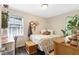 Comfortable bedroom featuring neutral decor, natural light, and hardwood floors at 1091 Napier Se St, Atlanta, GA 30316