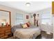 Cozy bedroom with hardwood floors, neutral walls, natural light, and a comfortable bed at 1091 Napier Se St, Atlanta, GA 30316