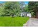 Well-manicured front yard with lush lawn and mature trees, offering ample space at 1091 Napier Se St, Atlanta, GA 30316