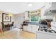 Functional kitchen with essential appliances and a cozy dining area at 1091 Napier Se St, Atlanta, GA 30316
