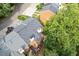 View of roof, deck, patio, and cooling system from above at 1995 Raleigh Tavern Dr, Roswell, GA 30076