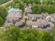Aerial view of a neighborhood with mature trees and a swimming pool at 262 Southerland Ne Ter, Atlanta, GA 30307