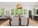 Open-concept dining area featuring hardwood floors and great natural lighting at 262 Southerland Ne Ter, Atlanta, GA 30307