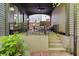 Charming covered front porch with comfortable seating and stylish railing, perfect for relaxing outdoors at 262 Southerland Ne Ter, Atlanta, GA 30307
