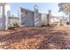 Spacious backyard featuring mature trees, a patio, and plenty of room for outdoor activities at 538 Shadowmoore Dr, Riverdale, GA 30274