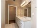 Bathroom featuring a double sink vanity with white cabinets at 538 Shadowmoore Dr, Riverdale, GA 30274