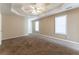 Spacious bedroom featuring a ceiling fan and carpeted floors at 538 Shadowmoore Dr, Riverdale, GA 30274
