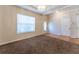 Well-lit dining area with carpet, recessed ceiling and neutral walls, perfect for entertaining guests at 538 Shadowmoore Dr, Riverdale, GA 30274