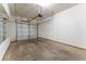 Spacious single-car garage with automatic door opener and plenty of room for storage at 538 Shadowmoore Dr, Riverdale, GA 30274