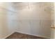 Walk-in closet featuring wire shelving and carpeted floor at 538 Shadowmoore Dr, Riverdale, GA 30274