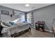 Comfortable bedroom features neutral decor, a double bed, and plenty of natural light at 575 Chapel Walk Ln, Lawrenceville, GA 30045