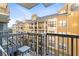 Condo balcony offers a relaxing outdoor space with views of the community and surrounding buildings at 795 Hammond Dr # 505, Atlanta, GA 30328