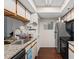Galley kitchen with stainless steel appliances and granite countertops at 795 Hammond Dr # 505, Atlanta, GA 30328