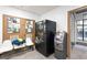 A lobby featuring vending machine, atm, a lounge area with chairs, and information board at 795 Hammond Dr # 505, Atlanta, GA 30328